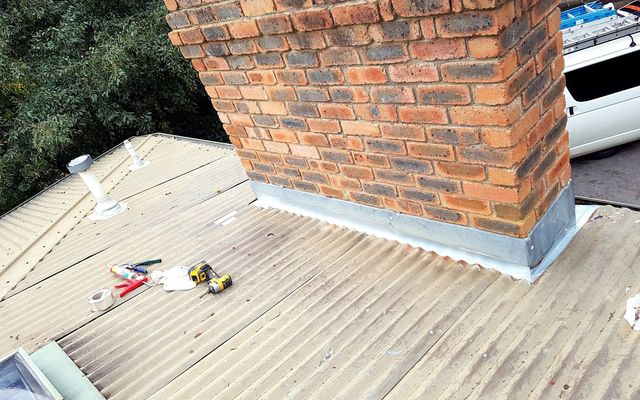 Chimney flashing installed on a corrugated roof